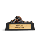 Dead Last fantasy football trophy: a bronze player lying face down under a football