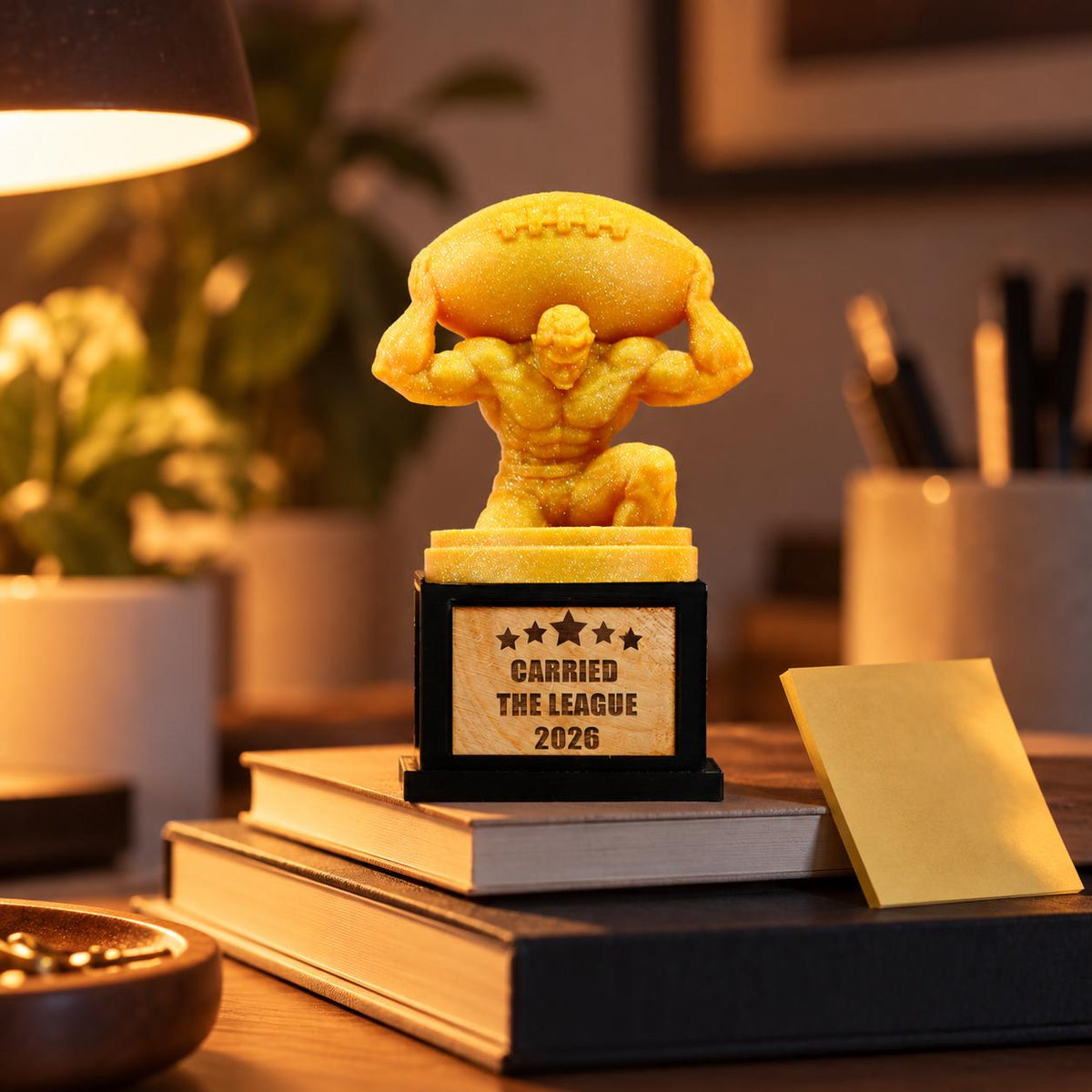 Carried the League trophy on a stack of books on a desk
