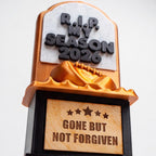 Close-up of the R.I.P. My Season gravestone and engraved plaque